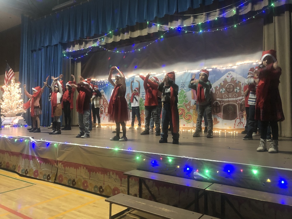 Students performing Christmas carols 